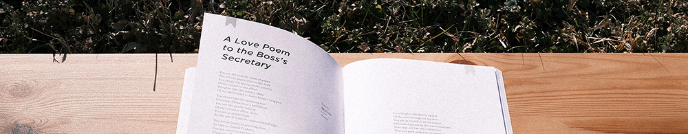 Photo of a booklet cover with the title 'Notations 2015' on a wood background